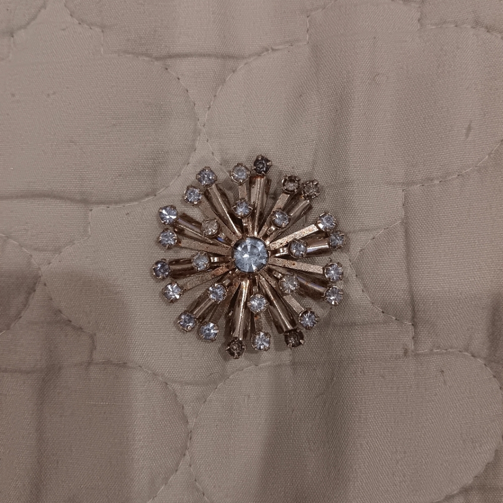 Vintage brooch with blue rhinestones